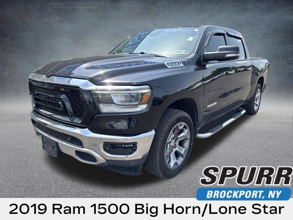 2019 RAM 1500 Big Horn/Lone Star in Bk — front three-quarter view