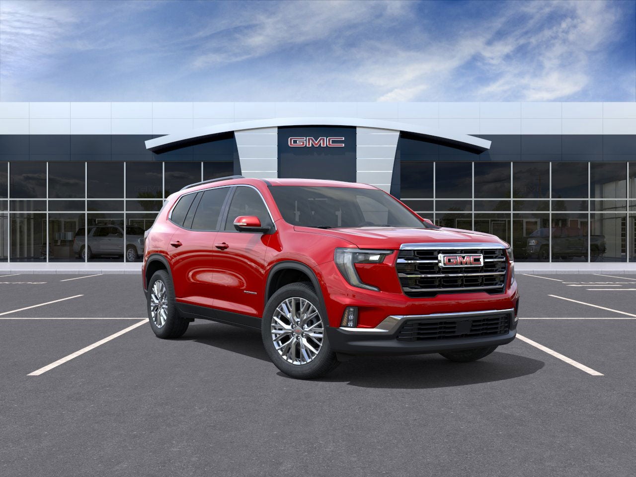 2026 GMC Acadia Elevation in Volcanic Red Tintcoat — front three-quarter view