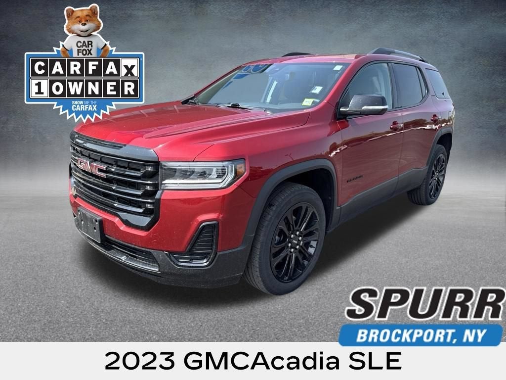 2023 GMC Acadia SLE in Volcanic Red Tintcoat — front three-quarter view