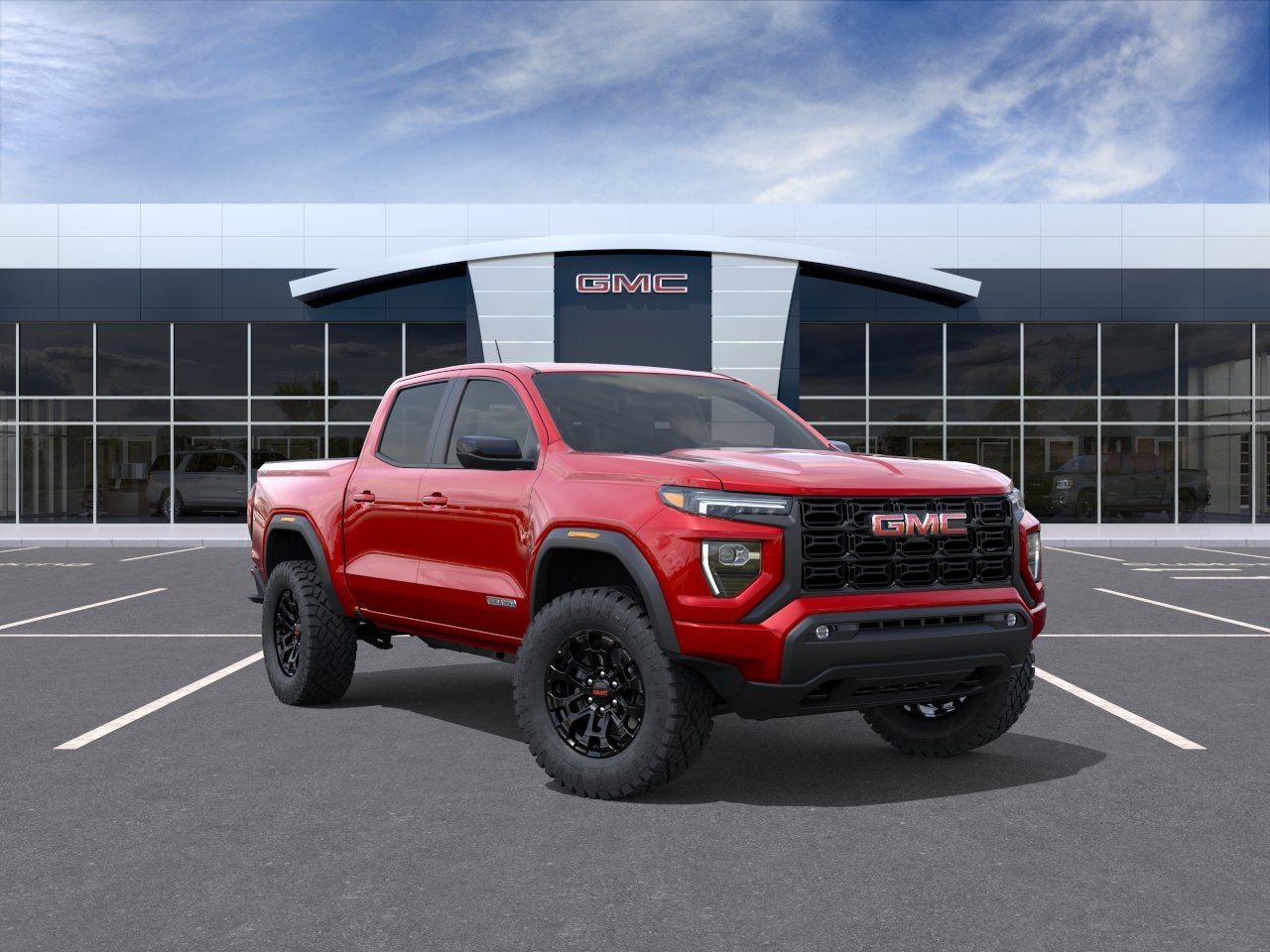 2026 GMC Canyon Elevation in Volcanic Red Tintcoat — front three-quarter view